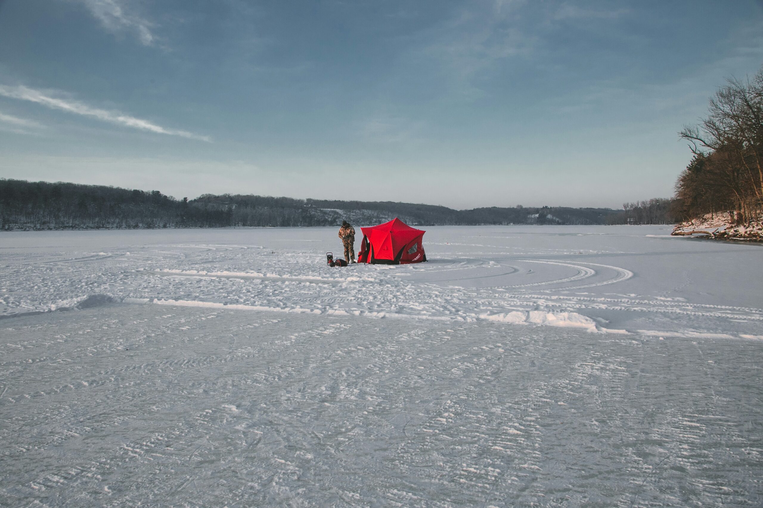 Ice fishing tent set up on ice